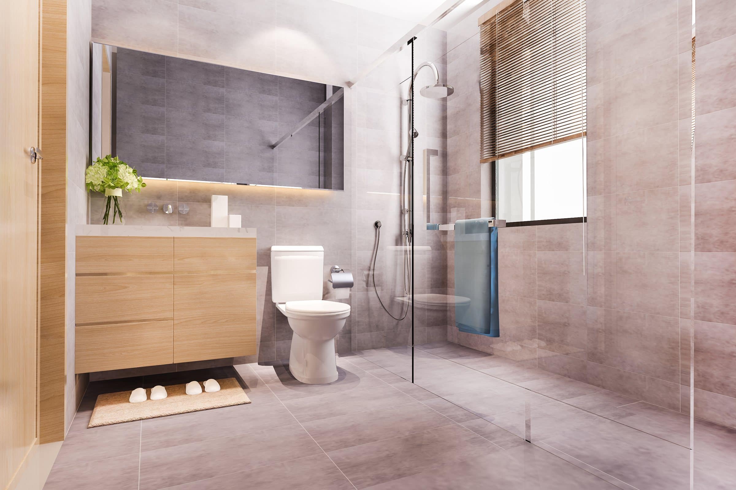 Modern bathroom with large-format tile, a floating vanity and a glass shower