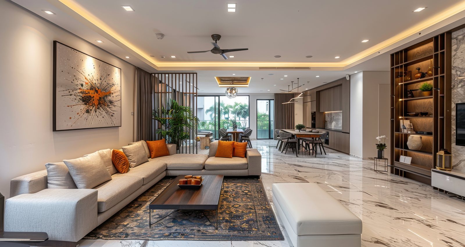 Open-plan living and dining room with warm lighting and a sectional sofa